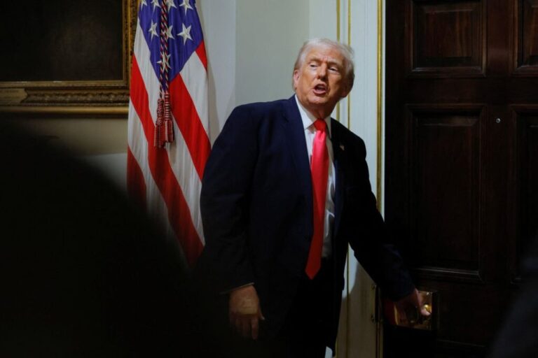 President Donald Trump speaks as he leaves a Cabinet meeting at the White House on December 2, 2025.