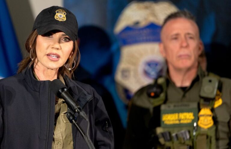 Secretary of Homeland Security Kristi Noem speaks during a press conference at the Bishop Henry Whipple Federal Building in Minneapolis, on January 7. Behind Noem stands Bovino.