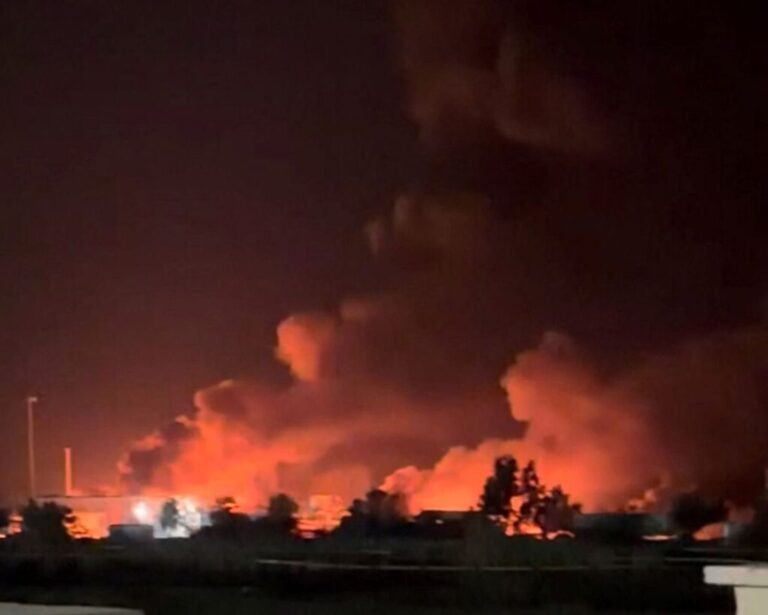 Smoke rises from a port near the Strait of Hormuz following a US strike in Kuhestak, Hormozgan Province, Iran, on Wednesday in this screengrab obtained from a social media video.