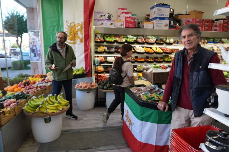 Reza Bahrami, a political refugee from Iran, poses for a portrait on March 2, 2026. Bahrami works at Jordan Market, a Middle Eastern and Persian market along Westwood Boulevard, in Los Angeles.
