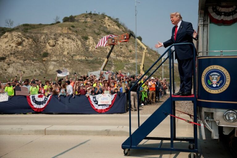 President Donald Trump steps off a ceremonial train after arriving for the dedication of the Theodore Roosevelt Presidential Library in Medora, North Dakota, on July 1.