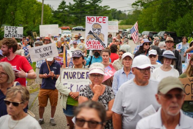 People protest outside of a federal immigration office in Scarborough, Maine, on July 14, 2026, after a man was fatally shot by ICE.
