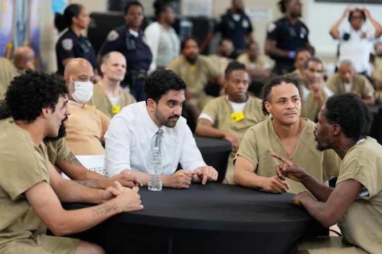 New York Mayor Zohran Mamdani speaks with Rikers Island inmates as they watch the World Cup semifinal soccer match between England and Argentina, at the jail complex in New York, on July 15.