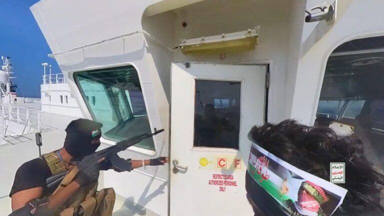 This handout screen grab captured from video shows Houthi fighters' takeover of the Galaxy Leader Cargo in the Red Sea coast off Al Hudaydah in Yemen on November 20, 2023.