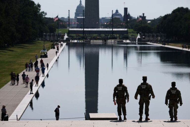Members of the National Guard patrol the Lincoln Memorial Reflecting Pool on the National Mall on June 25 in Washington, DC.