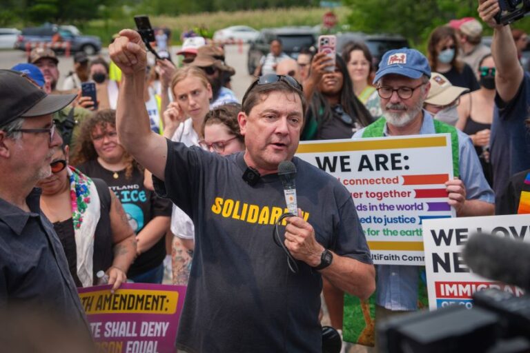 Troy Jackson, Democratic candidate for US Senate, speaks during a demonstration outside of a federal immigration office in Scarborough, Maine, on Tuesday, after a man was fatally shot by US Immigration and Customs Enforcement agents.