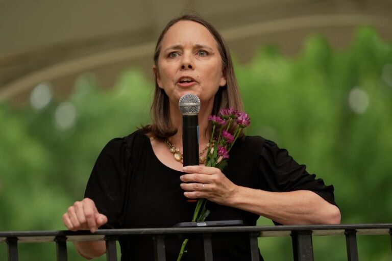 Maine Secretary of State Shenna Bellows speaks at a vigil in Lewiston, Maine, on Tuesday, a day after the shooting of a man by US Immigration and Customs Enforcement.