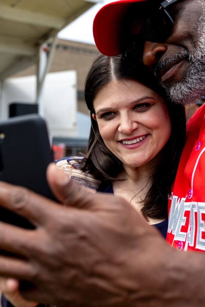 Stevens poses for a photo with an attendee at the Soul Day Festival in Detroit.