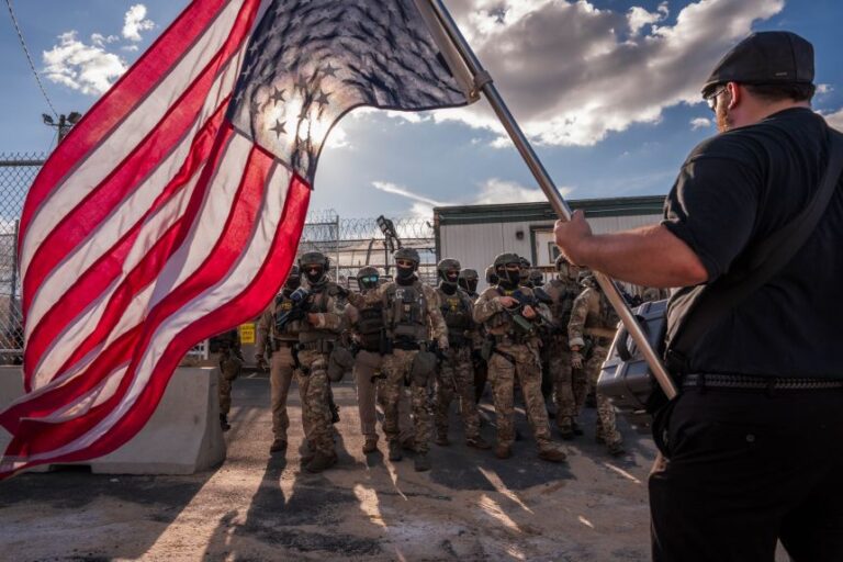 Immigration and Customs Enforcement (ICE) agents face off with protesters during a shift change outside of Delaney Hall Immigration Detention Center on June 7, 2026, in Newark, New Jersey.