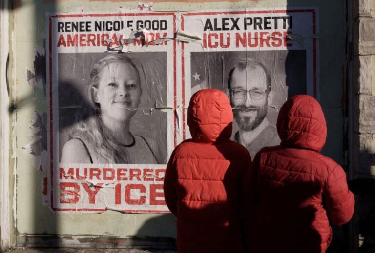 Children look at posters honoring Alex Pretti and Renee Nicole Good, in Minneapolis, on January 31.