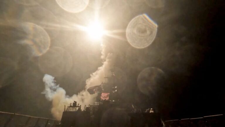 A US warship launches a munition at an unknown location during a wave of strikes on Iran in this image taken from handout video on July 16, 2026.