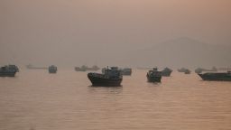 Vessels are anchored in the Strait of Hormuz as seen from Musandam, Oman, June 3, 2026.