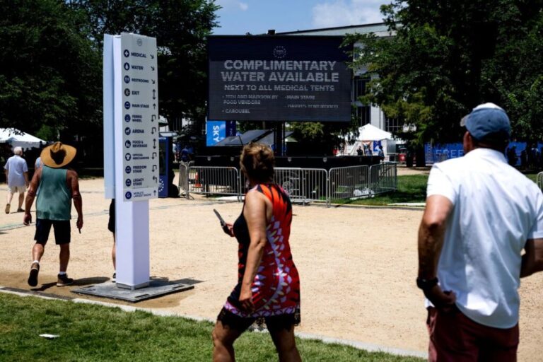 A sign directing people toward complimentary water at the