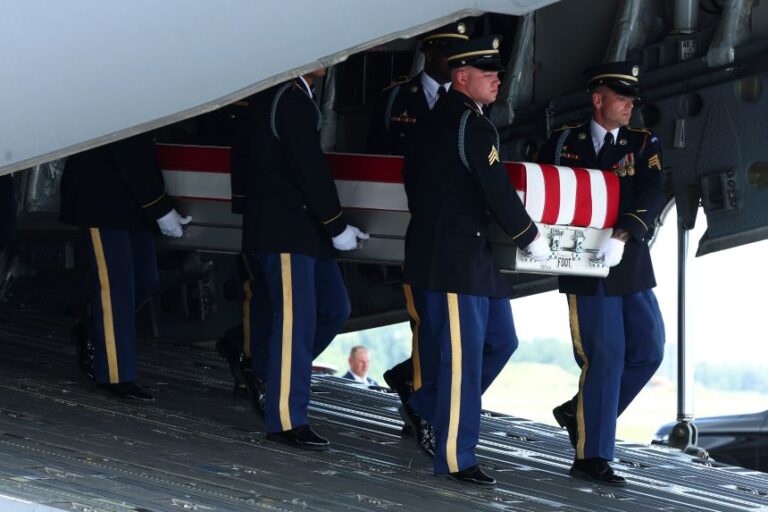Members of a US Army carry team move the flag-draped transfer case holding the remains of Army Pvt. Isabella Gonzales, of Carrollton, Texas, during a dignified transfer at Dover Air Force Base on Wednesday.