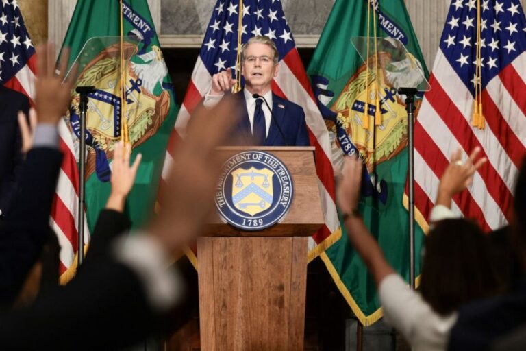 Treasury Secretary Scott Bessent points as reporters raise their hands during a news conference at the Treasury Department in Washington, DC, on August 24.