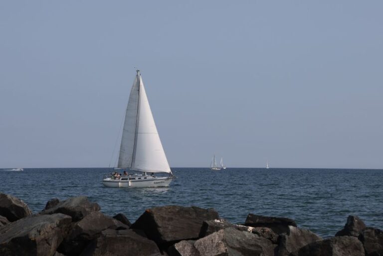 A sailboat is sailing along Lake Ontario near Centre Island in Toronto, Ontario, Canada, on July 13, 2024. (Photo by Creative Touch Imaging Ltd./NurPhoto via Getty Images)