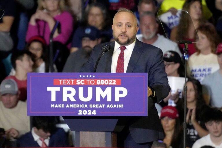 Rep. Russell Fry speaks ahead of a rally with Donald Trump in February 2024.