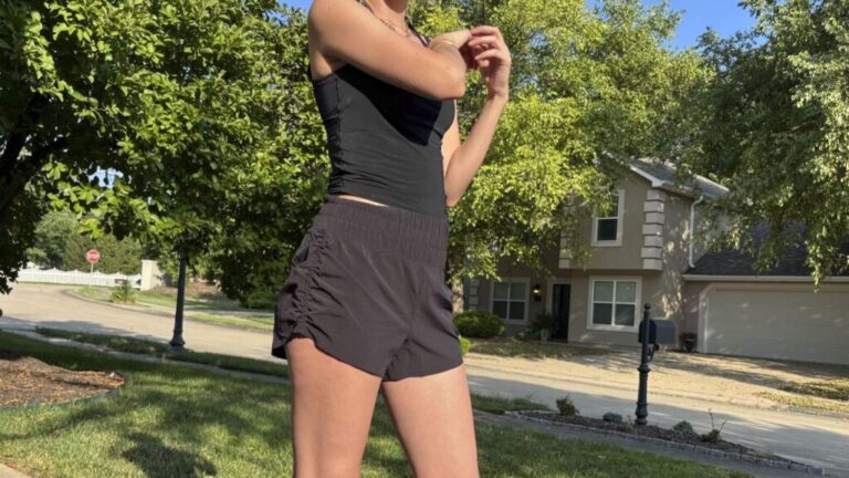 A woman wearing black Cooling spanx shorts