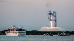 Starship's Super Heavy Booster is grappled at the launch pad in Starbase near Boca Chica, Texas, on October 13, 2024, during the Starship Flight 5 test. SpaceX successfully