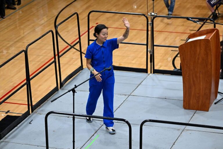 Wisconsin gubernatorial candidate Francesca Hong waves during a campaign rally on August 2, 2026 in Milwaukee, Wisconsin.