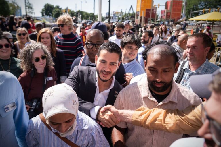 Abdul El-Sayed departs following a news conference at the Spirit of Detroit shortly after winning the Democratic nomination for US Senate in Michigan, on Wednesday, Aug. 5.