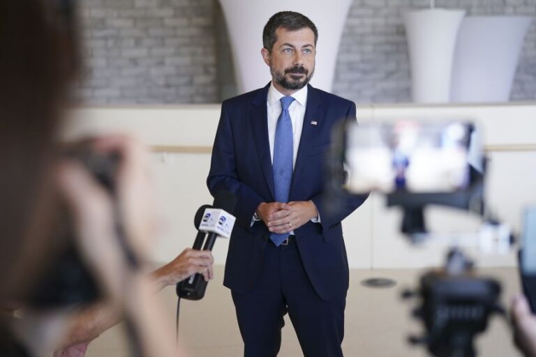 Former US Transportation Secretary Pete Buttigieg speaks to reporters during the Spratt Issues Conference at the Francis Marion University Performing Arts Center on August 22 in Florence, South Carolina.