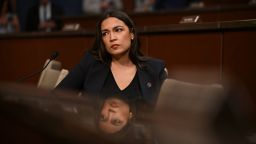 US Rep. Alexandria Ocasio-Cortez of New York listens to testimony from witnesses during a hearing of the House Committee on Oversight and Government Reform on state immigration policies on Capitol Hill in Washington, DC, in June 2025.