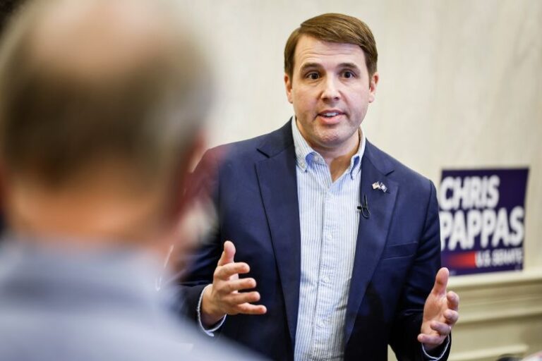 Rep. Chris Pappas speaks to members of the press during a campaign stop in Manchester, New Hampshire, on February 19.