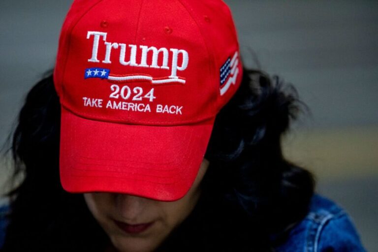 An attendee wears a hat supporting former President Donald Trump on November 1, 2024 in at Spartan Northwood Warehouse in Northwood, Ohio.