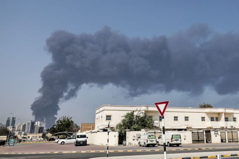 Smoke rising from the direction of a major UAE energy installation on March 14, 2026 in what appeared to be the latest strike targeting the Gulf's petroleum facilities hours after the US struck Iran's Kharg Island.