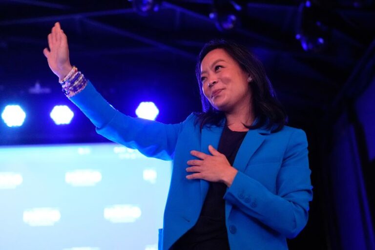Francesca Hong waves to supporters after speaking during a primary election night watch party in Madison, Wisconsin, on Tuesday.