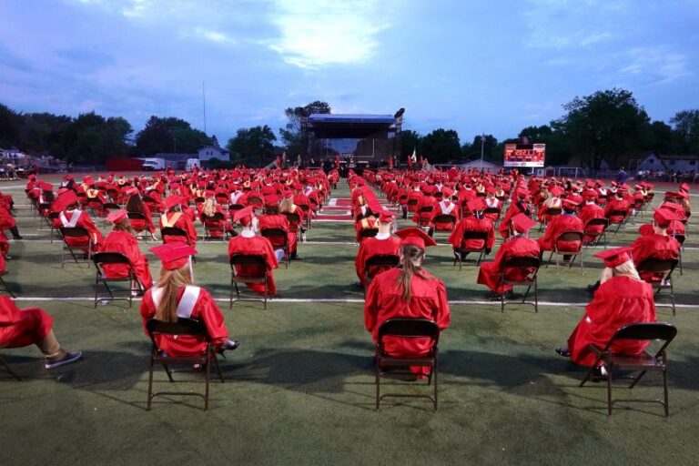 Students listen to speakers during their graduation ceremony at Bradley-Bourbonnais Community High School in Bradley, Illinois, on May 21, 2021.