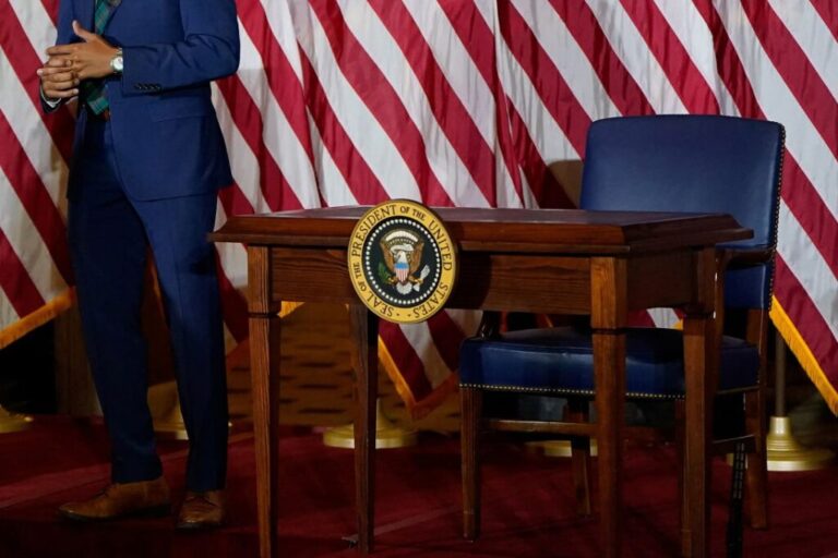 A signing desk sits on an event stage erected in Statuary Hall on Capitol Hill after President Donald Trump canceled a signing of a bipartisan housing bill on June 24, 2026.