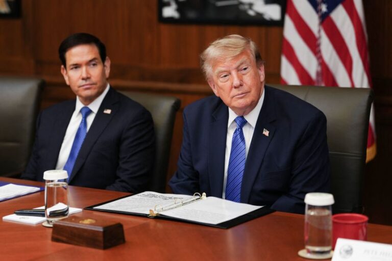 President Donald Trump, alongside US Secretary of State Marco Rubio (left), speaks during a Cabinet meeting at Camp David in Maryland, on July 31.