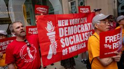 Demonstrators hold a