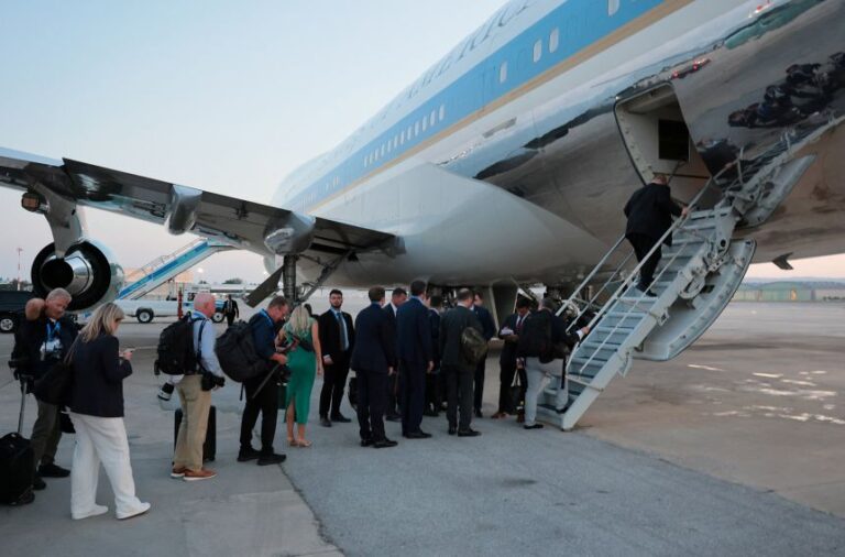 People board Air Force One at Ankara Esenboga Airport in Ankara, Turkey, on July 8.