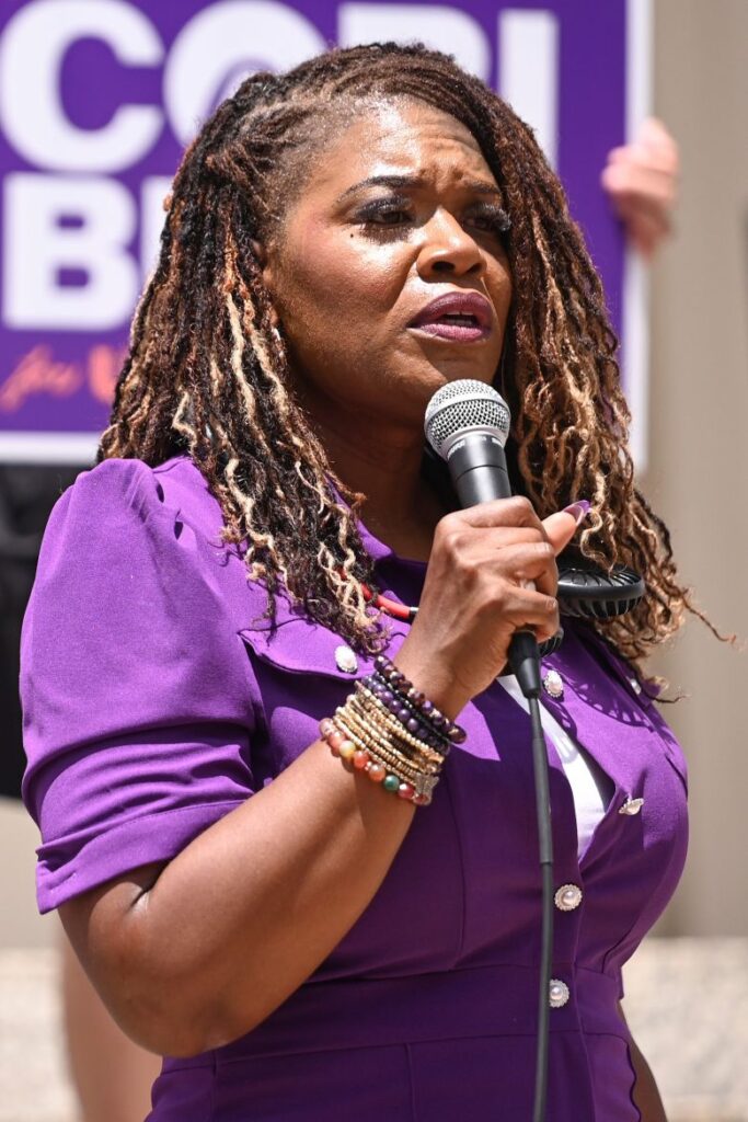 Former Rep. Cori Bush speaks during a campaign rally in St. Louis, on July 18.