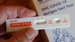 In this photo illustration, a positive Covid home test is shown in San Anselmo, California, on March 10, 2025.