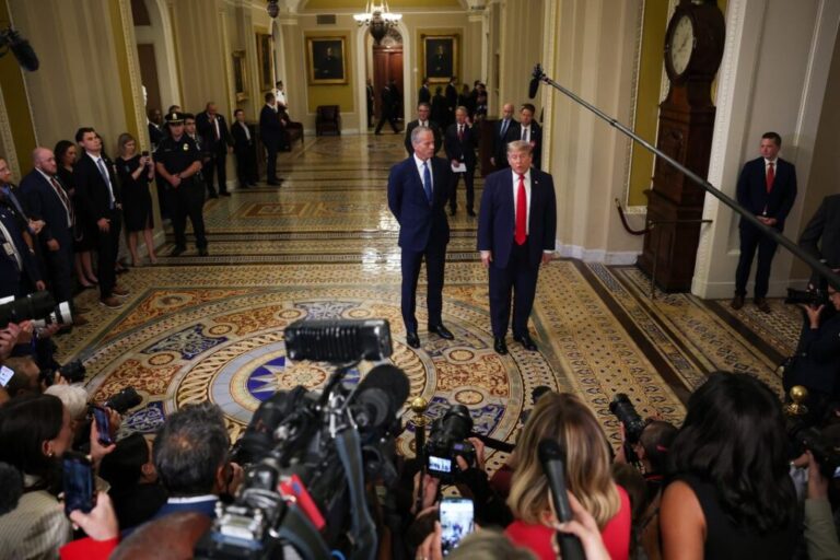 Senate Majority Leader John Thune watches as Trump speaks to the media as they arrive at the US Capitol to attend a closed-door luncheon with the Republican Senate Steering Committee to push his SAVE America Act on June 24 in Washington, DC.