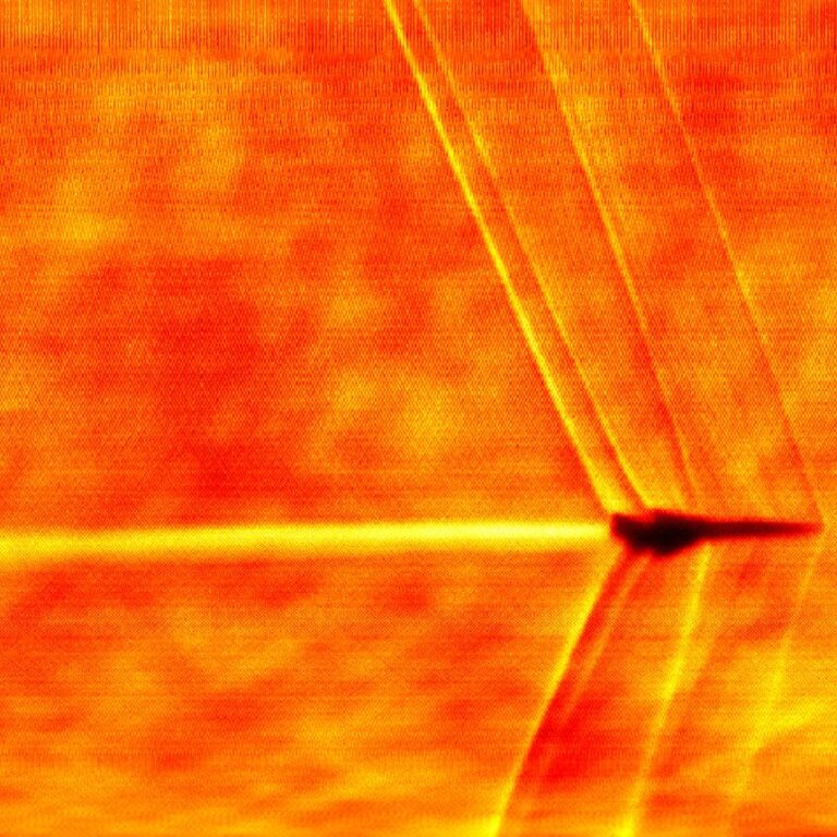 A Schlieren image of the Boom XB-1 visualizes the flow away from the surface of the aircraft.