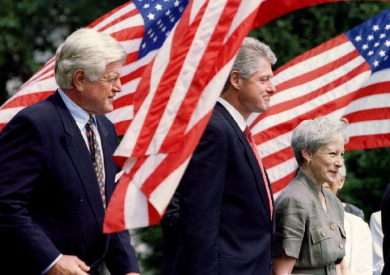 US President Bill Clinton arrives with health bill sponsors, Sens. Ted Kennedy and Nancy Kassebaum for the bill signing ceremony at the White House, August 21, 1996.