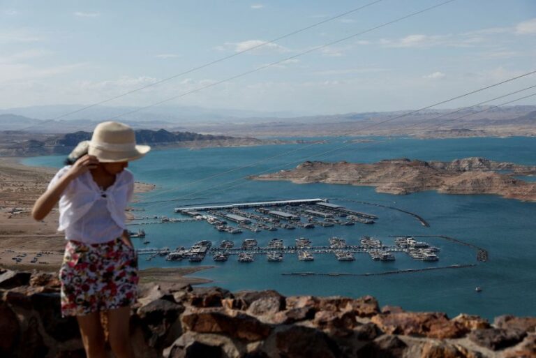 A person stands at an overlook above Lake Mead near Boulder City, Nevada, on July 21, 2026.