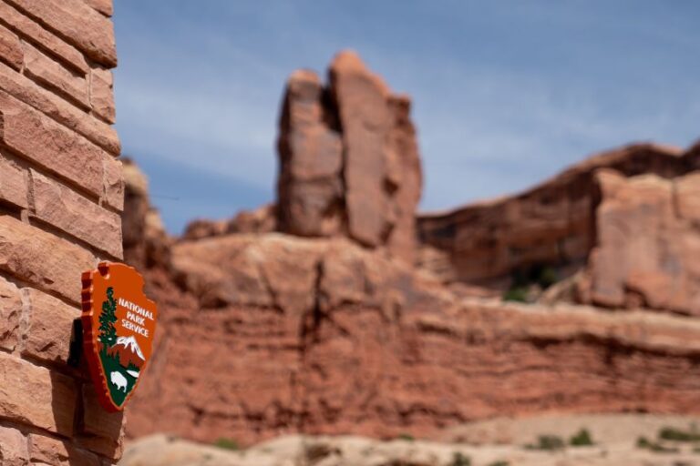A National Park Service sign outside Arches National Park in Moab, Utah, on May 17, 2025.