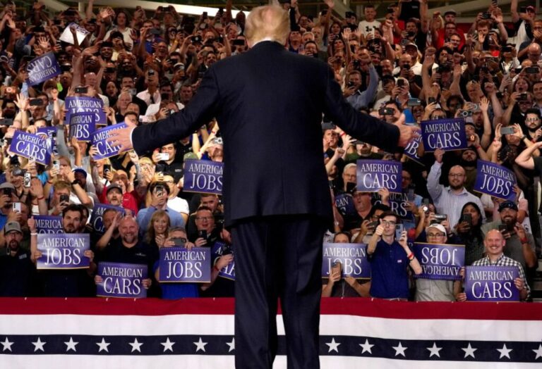 President Donald Trump greets the audience before speaking at General Motors’ Milford Proving Grounds on July 27, 2026 in Milford, Michigan.