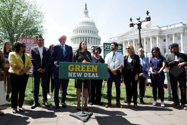 U.S. Rep. Alexandria Ocasio-Cortez speaks as Sen. Ed Markey and other participants listen during a news conference on the “Green New Deal” in front of the U.S. Capitol on April 20, 2023 in Washington, DC.