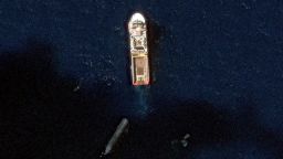 A zoomed-in satellite image taken on August 3 shows the Normand Ranger next to the 170 foot long Starship. A small boat can be seen floating next to the rocket.