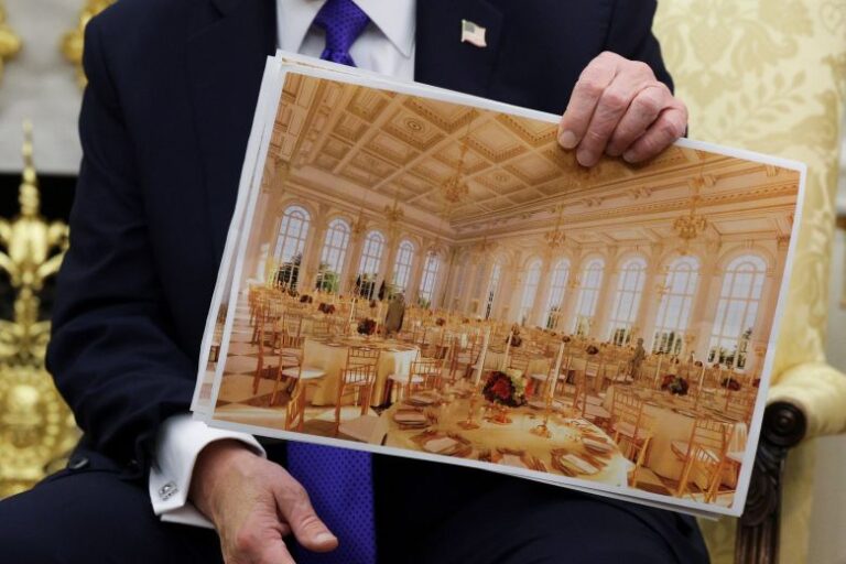 President Donald Trump displays a rendering of his proposed $250 million White House ballroom as he meets with NATO Secretary General Mark Rutte in the Oval Office of the White House on October 22, 2025 in Washington, DC.