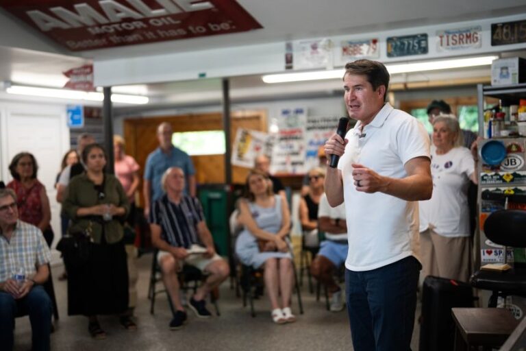 Rep. Seth Moulton talks with voters during an event in Chelmsford, Mass., on Sunday, August 16, 2026.