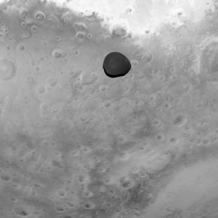 Deimos appears dark when framed by bright Mars from Hera's perspective.