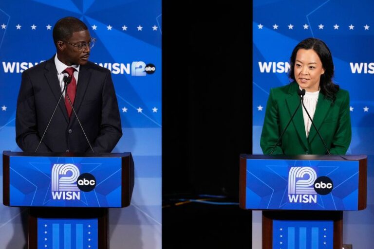 Crowley listens as fellow Democratic gubernatorial candidate Francesca Hong speaks during a primary debate in Milwaukee, on July 28.